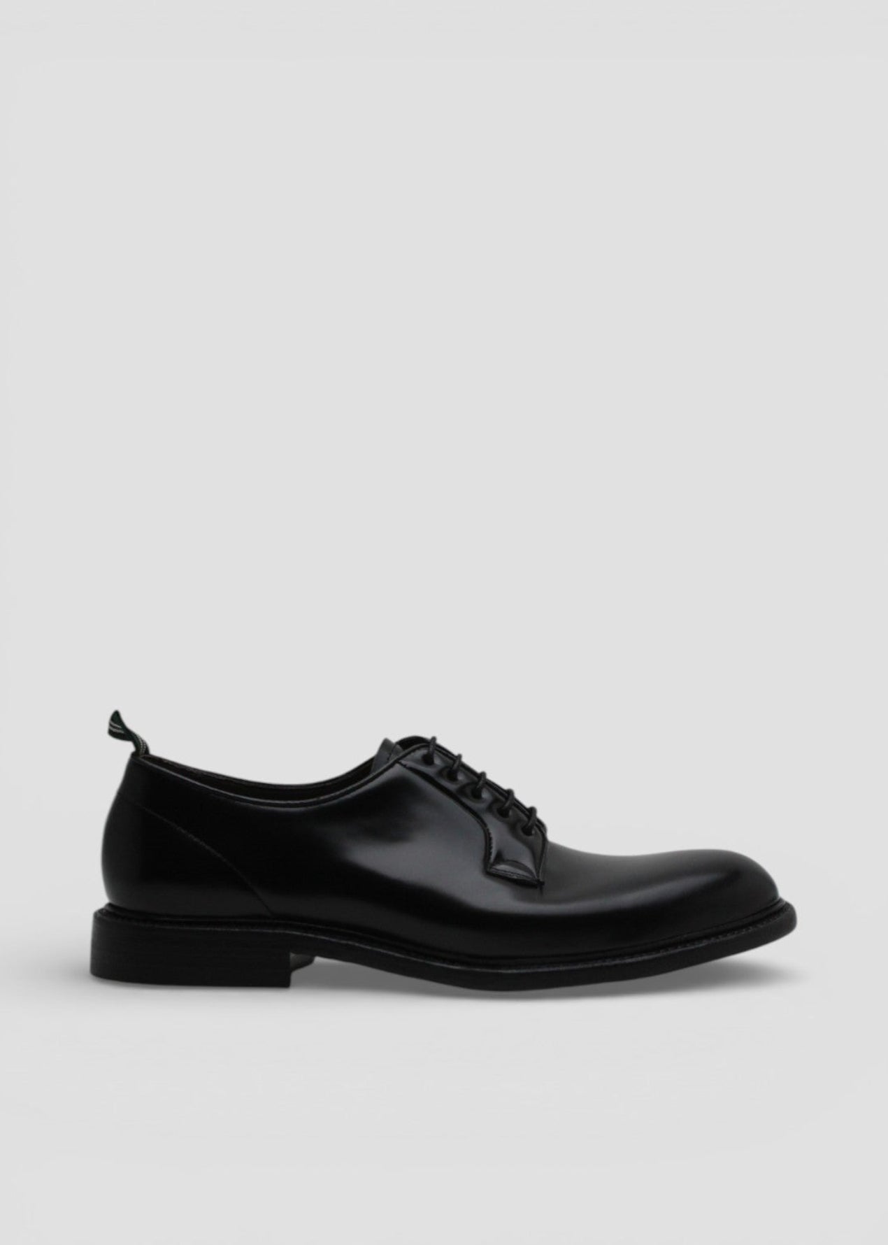 SS26-3029. STRINGATA UOMO IN PELLE NERA