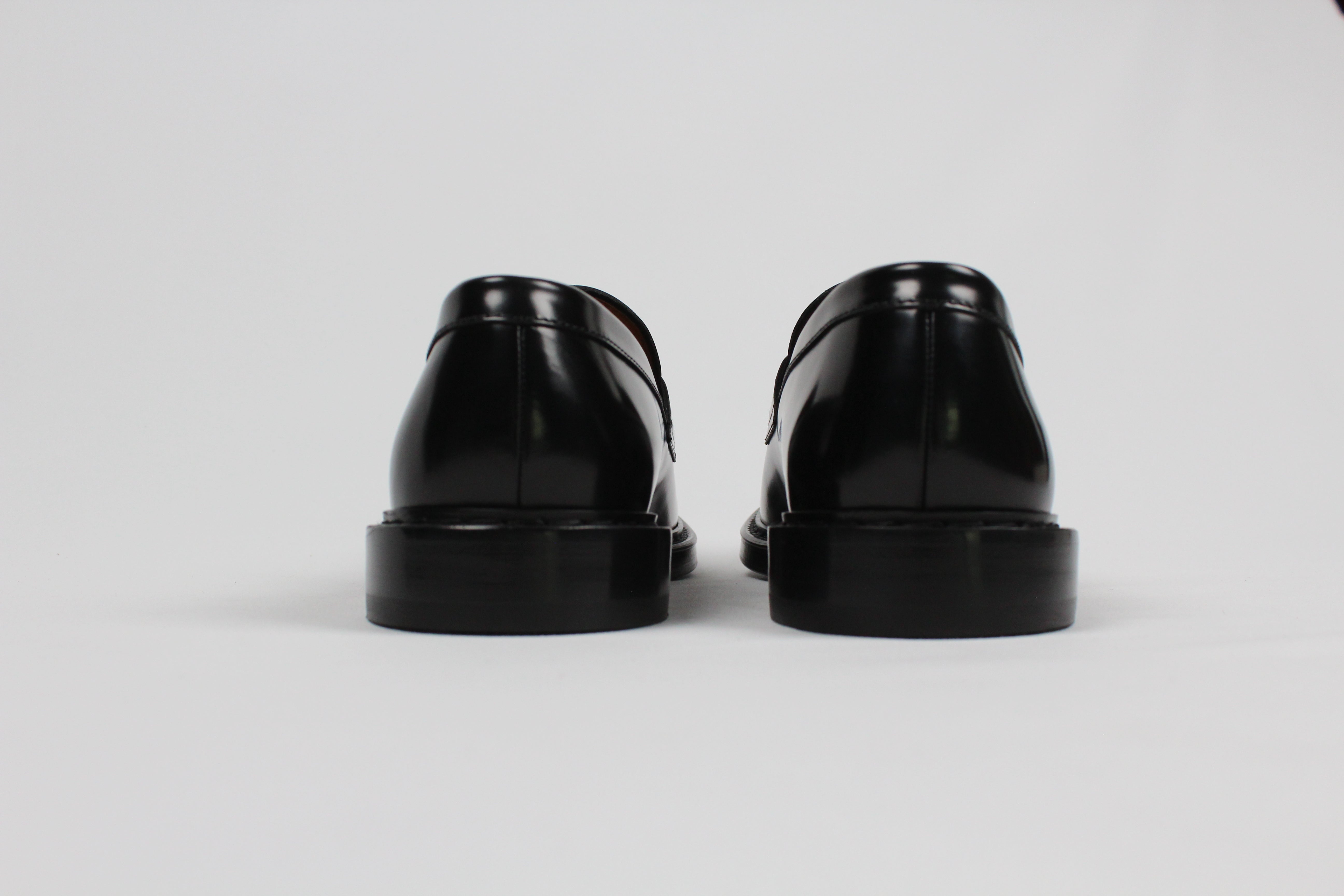 AI/SS25-DU2528SIEWUF007NN00. MOCASSINO PENNY PELLE NERA