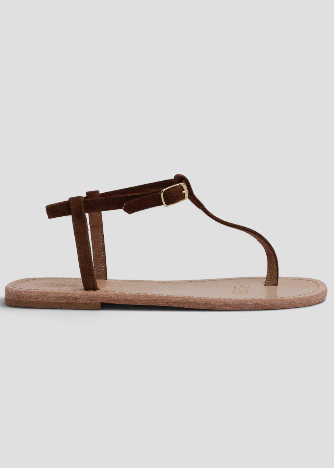 INDRID – SANDALO INFRADITO IN SUEDE NOCCIOLA CON CINTURINO ALLA CAVIGLIA
