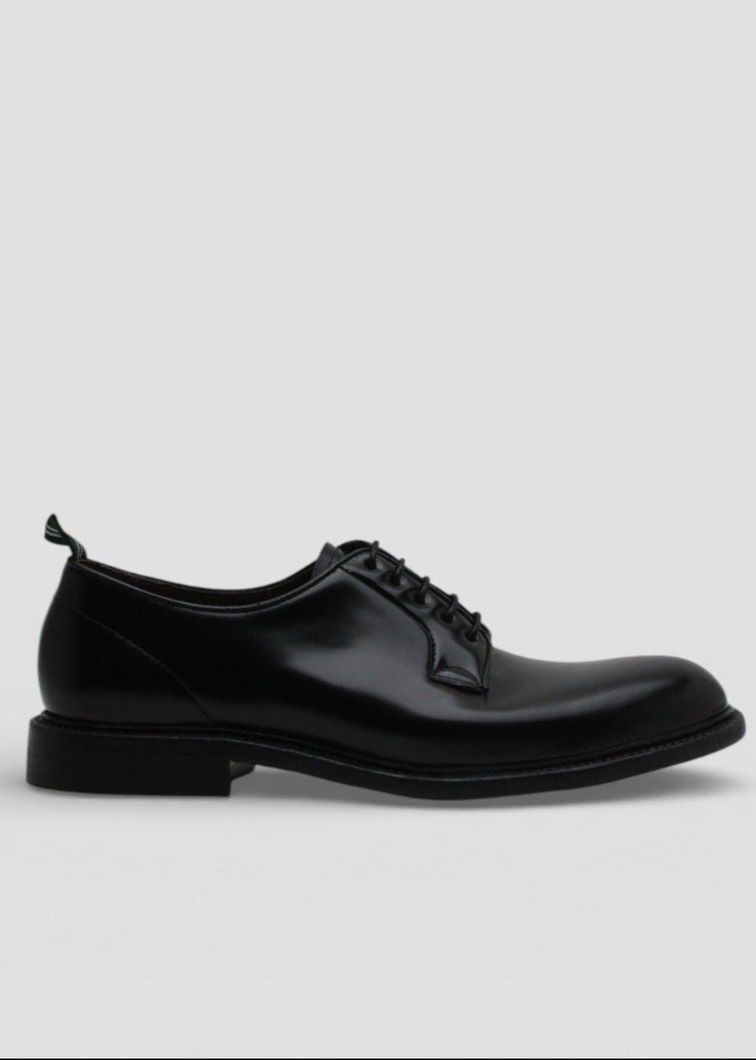 3029.  STRINGATA UOMO IN PELLE NERA