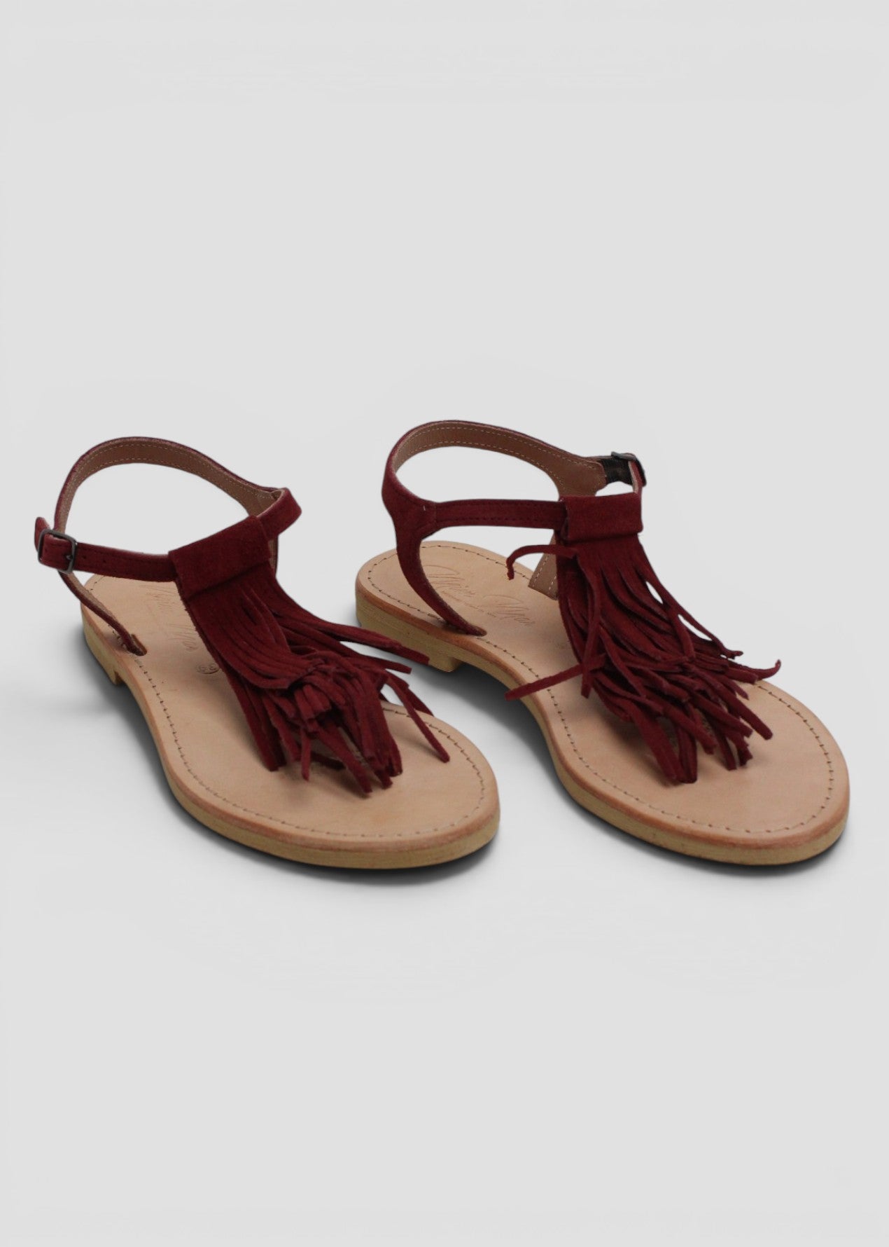 ARIEL – SANDALO INFRADITO IN SUEDE BORDEAUX CON FRANGE E CINTURINO ALLA CAVIGLIA