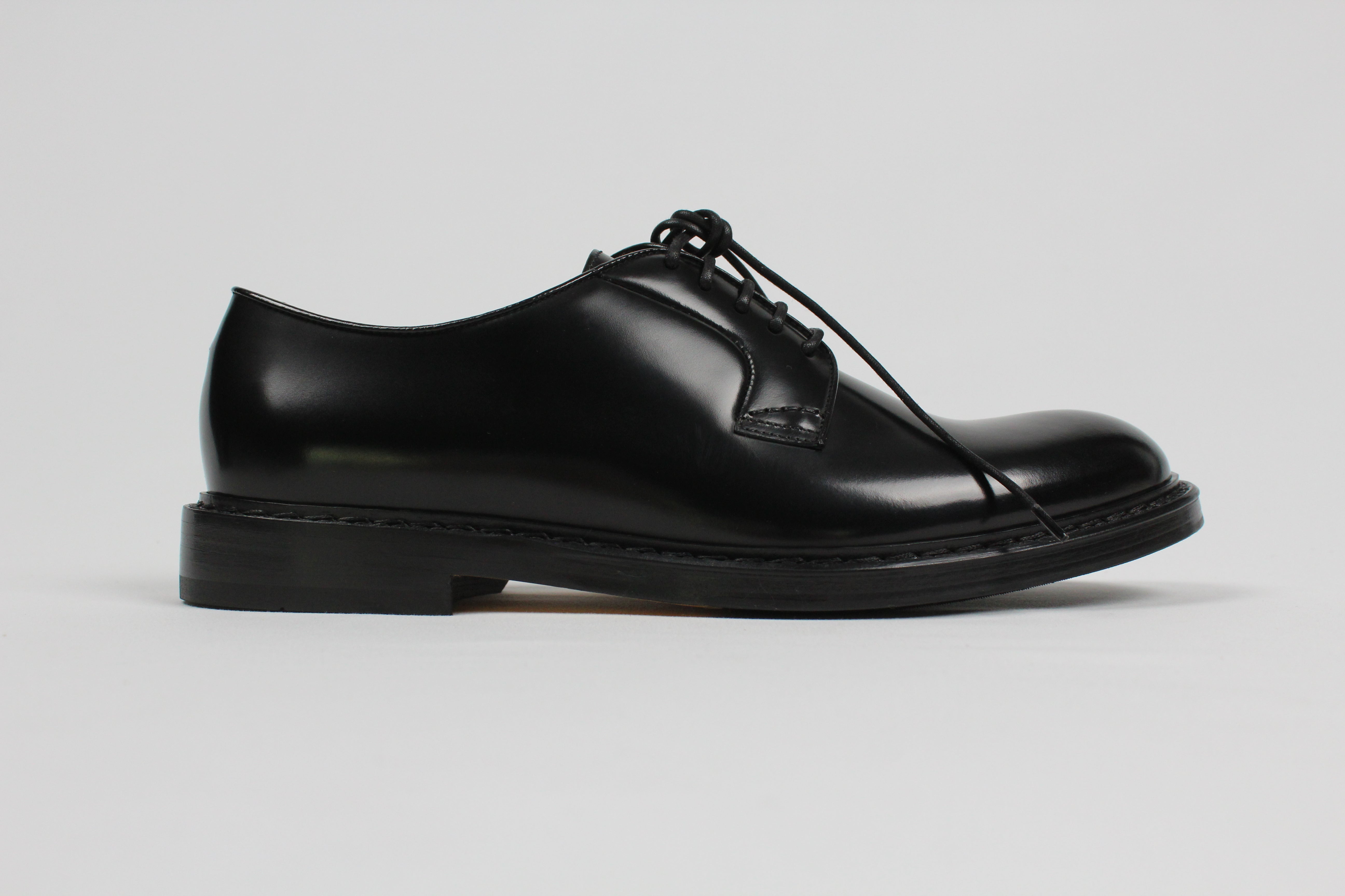 AI/SS25-DU1385SIEWUF007NN00. STRINGATA IN PELLE NERA