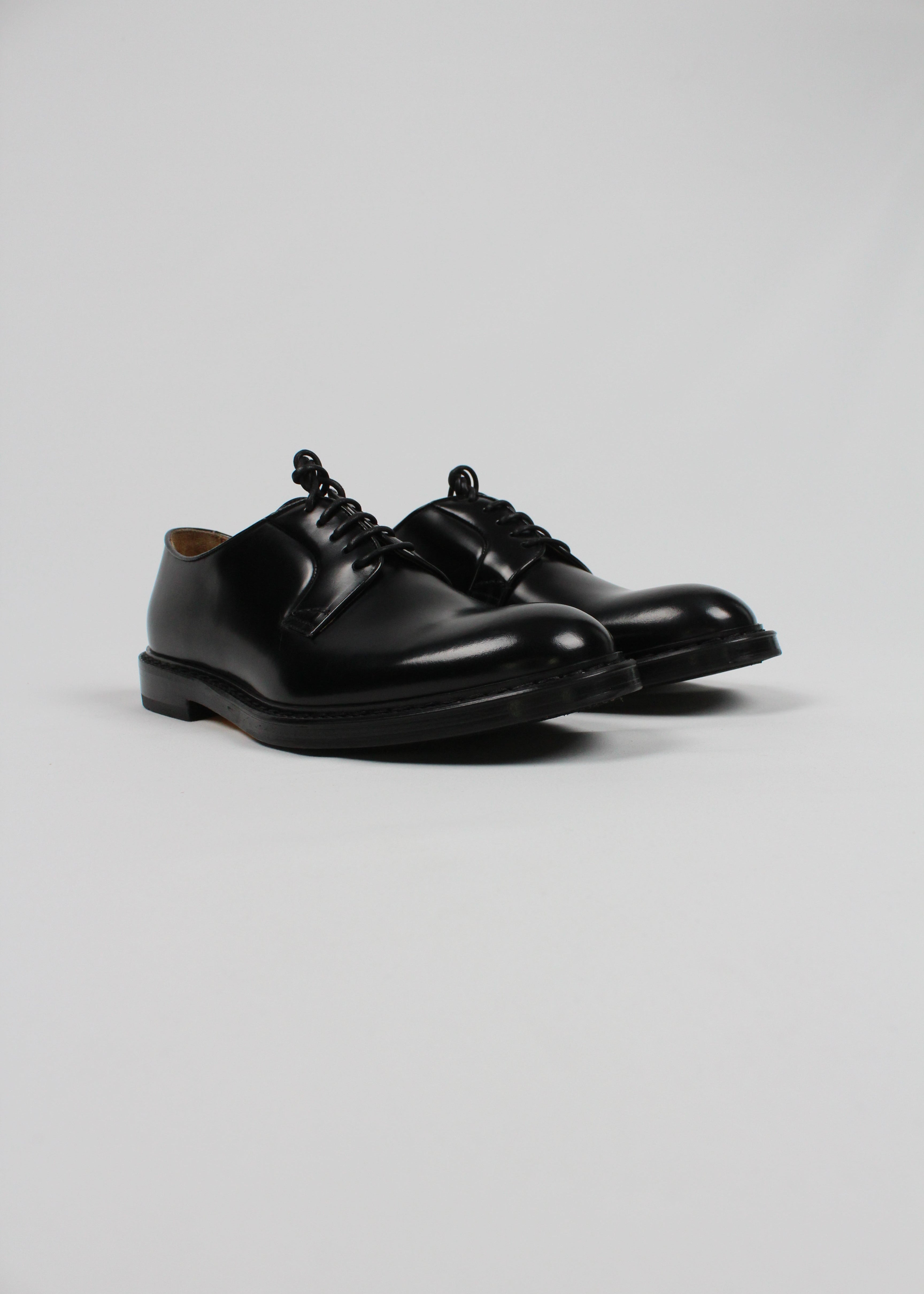 AI/SS25-DU1385SIEWUF007NN00. STRINGATA IN PELLE NERA