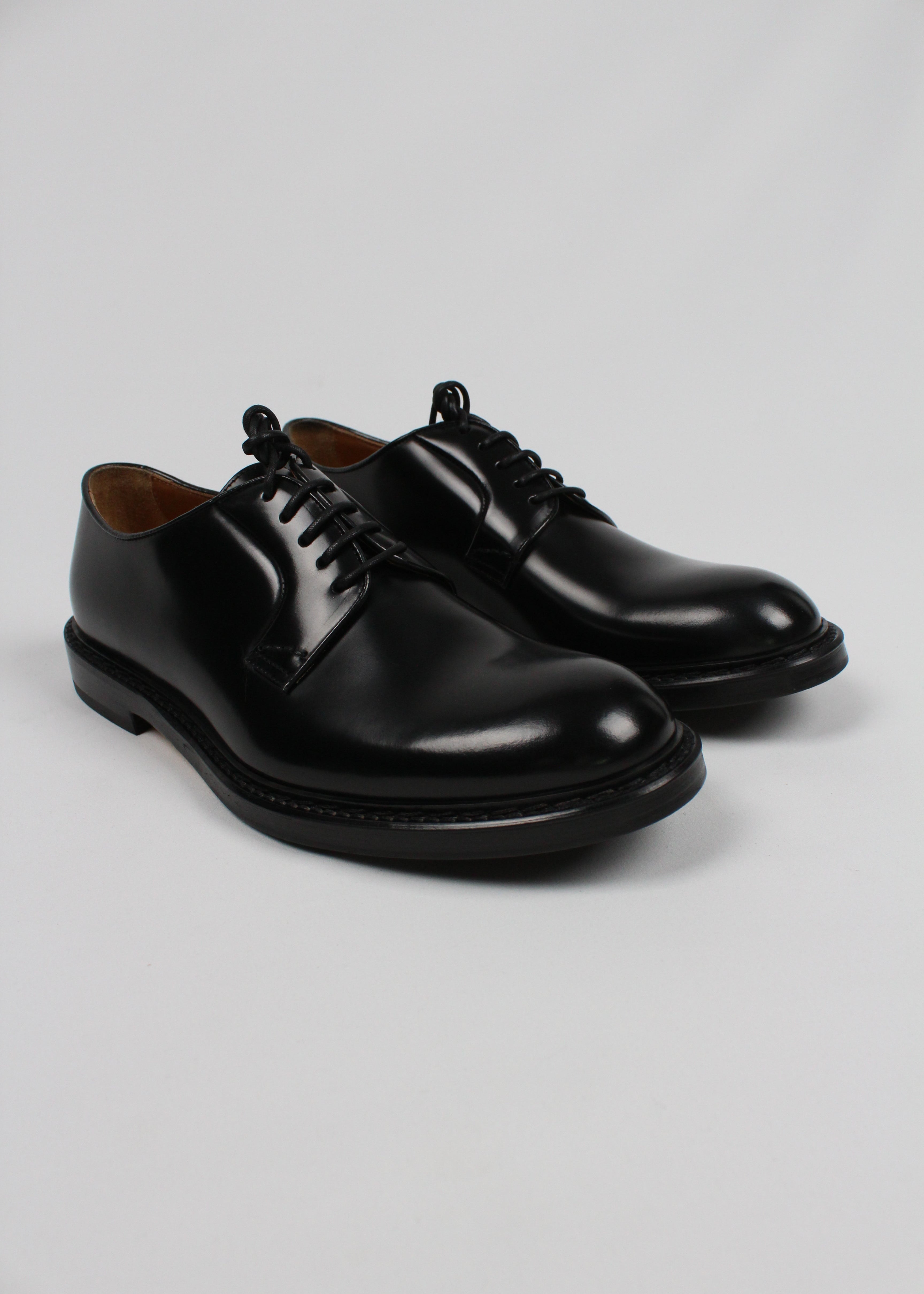 AI/SS25-DU1385SIEWUF007NN00. STRINGATA IN PELLE NERA