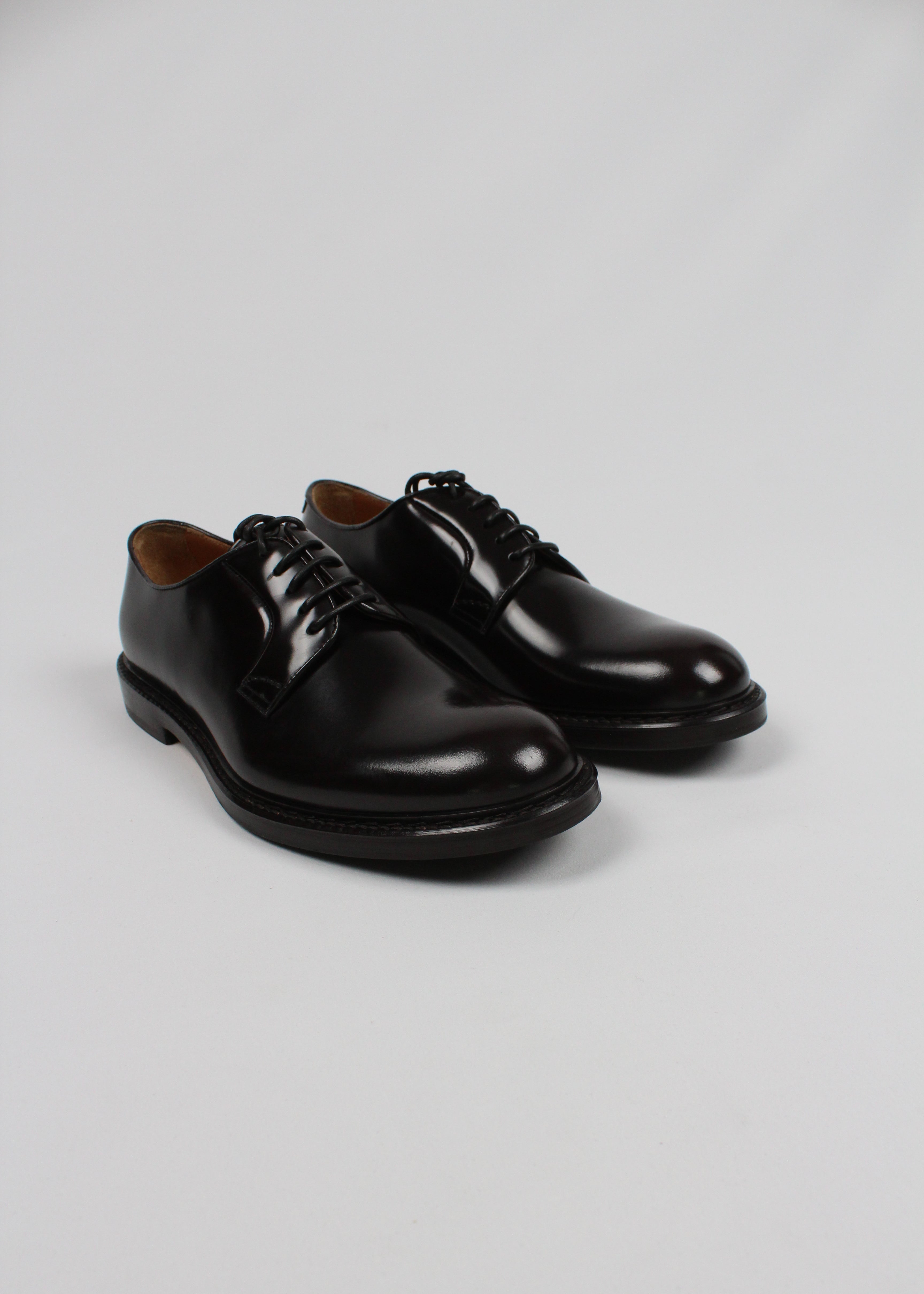 AI/SS25-DU1385SIEWUF007TM02  STRINGATA IN PELLE EBANO