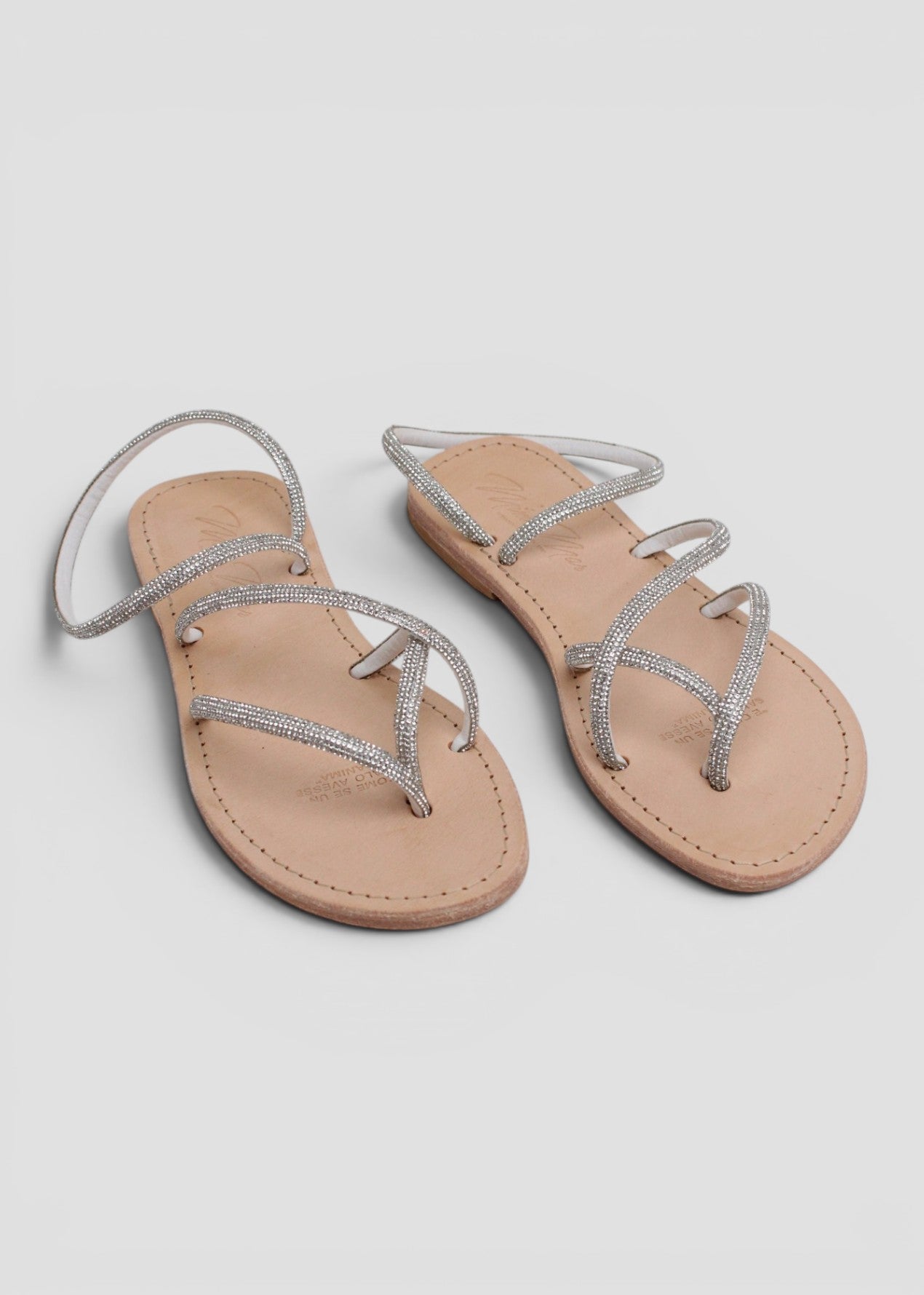 GEMMA – SANDALO INFRADITO IN STRASS COLOR ARGENTO CON CINTURINO ALLA CAVIGLIA
